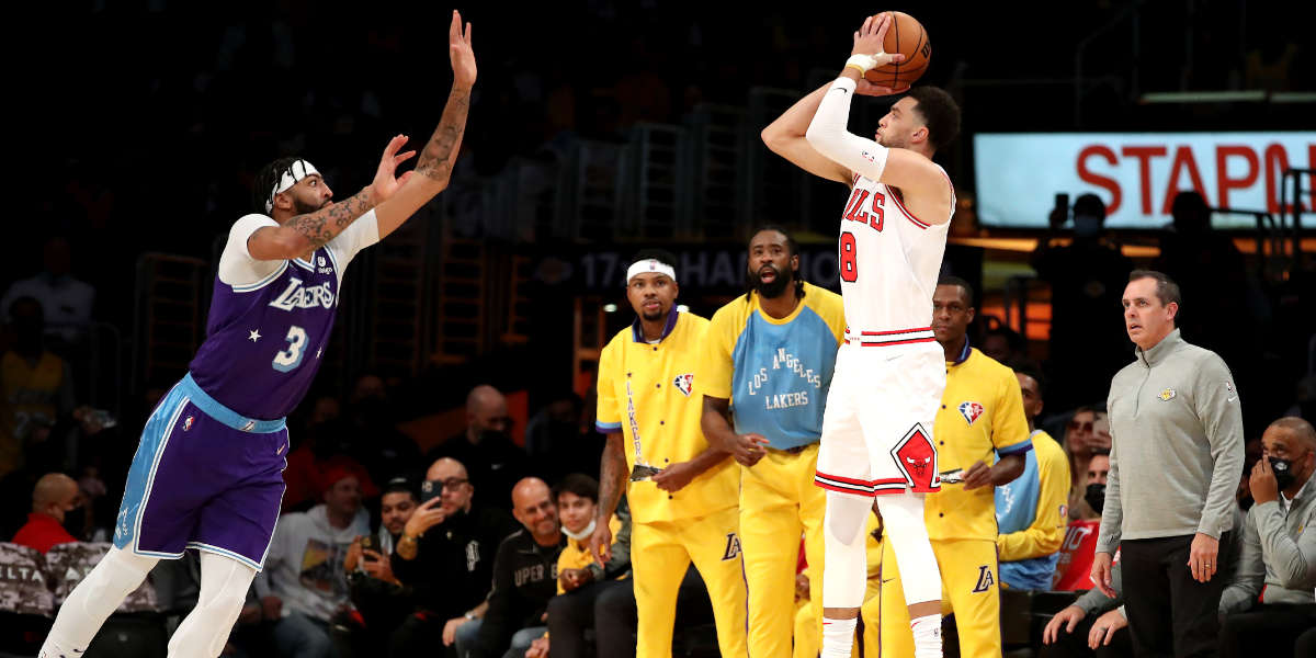 Zach LaVine of the Chicago Bulls shoots over Anthony Davis.