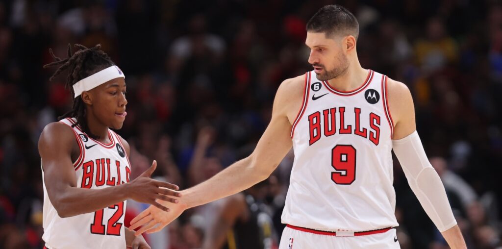 Nikola Vucevic of the Chicago Bulls with Ayo Dosunmu