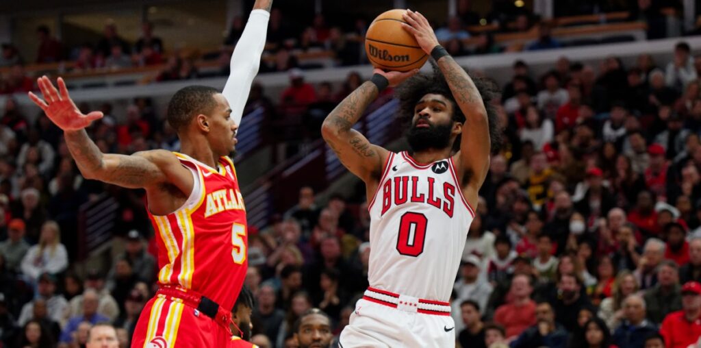 Coby White of the Chicago Bulls takes a shot over the Atlanta Hawks