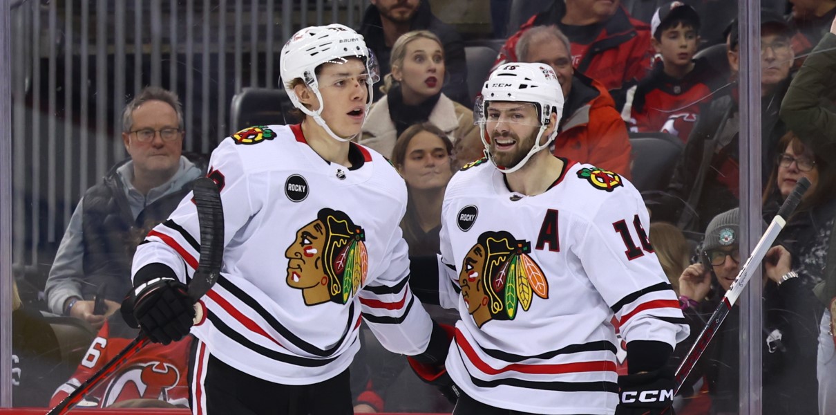 Alex Vlasic Jason Dickinson Chicago Blackhawks