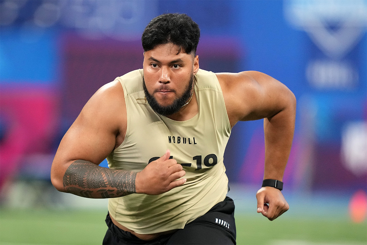 Mar 3, 2024; Indianapolis, IN, USA; Washington offensive lineman Troy Fautanu (OL19) during the 2024 NFL Combine at Lucas Oil Stadium. Mandatory Credit: Kirby Lee-USA TODAY Sports