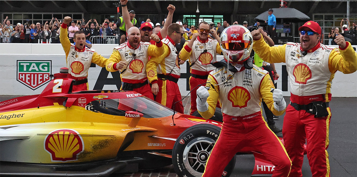 Team Penske driver Josef Newgarden (2) celebrates with his crew members, Sunday, May 26, 2024, after winning the 108th running of the Indianapolis 500 at Indianapolis Motor Speedway. *Alex Martin / Journal and Courier / USA TODAY NETWORK