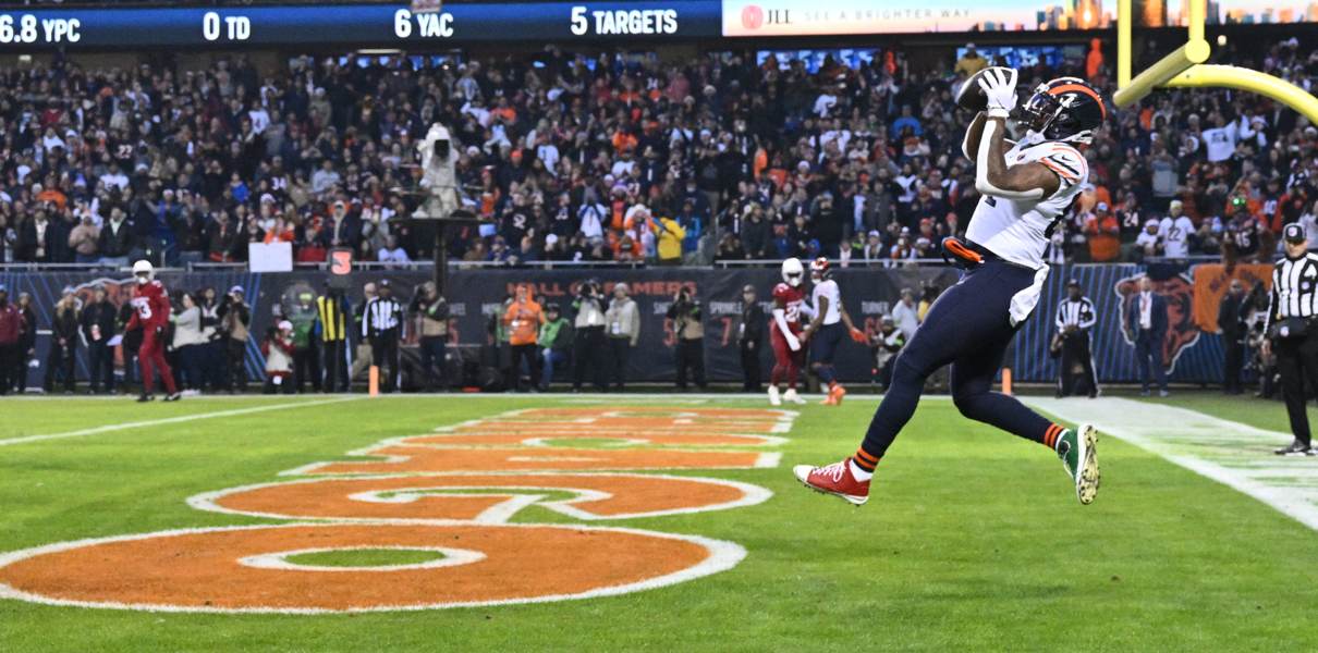 Dec 24, 2023; Chicago, Illinois, USA; Chicago Bears tight end Marcedes Lewis (84) catches a one-yard touchdown pass in the first half against the Arizona Cardinals at Soldier Field. Mandatory Credit: Jamie Sabau-USA TODAY Sports