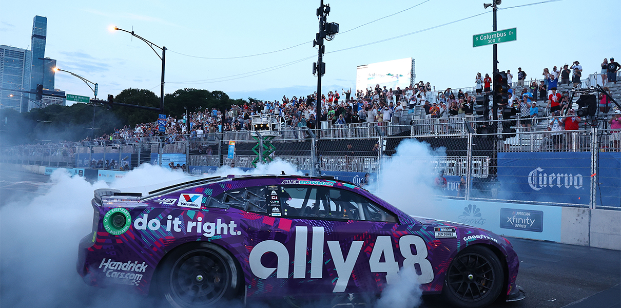 Jul 7, 2024; Chicago, Illinois, USA; NASCAR Cup Series driver Alex Bowman (48) does a burn out after winning the Grant Park 165 at Chicago Street Race. Mandatory Credit: Mike Dinovo-USA TODAY Sports