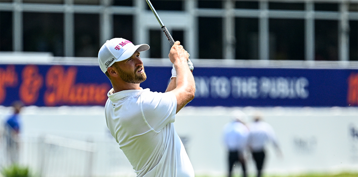 Aug 15, 2024; Memphis, Tennessee, USA; Wyndham Clark hits from the 18th fairway during the first round of the FedEx St. Jude Championship golf tournament at TPC Southwind. Mandatory Credit: Steve Roberts-USA TODAY Sports